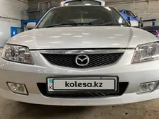 Mazda Familia, 2002