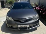 Toyota Camry 2014 годаfor8 300 000 тг. в Шымкент