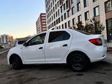 Renault Logan 2014 года за 1 800 000 тг. в Астана – фото 4