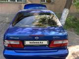 Nissan Almera 1998 года за 1 200 000 тг. в Караганда – фото 2