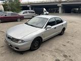 Mitsubishi Carisma 1997 года за 700 000 тг. в Алматы – фото 3