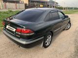 Mazda 626 1999 года за 2 777 777 тг. в Алматы – фото 4