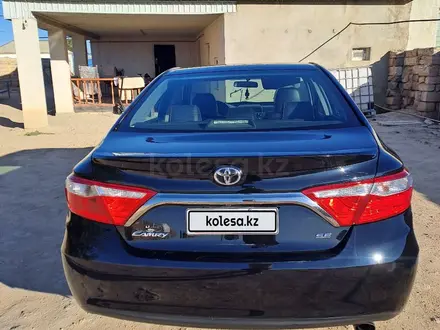 Toyota Camry 2015 года за 4 800 000 тг. в Жанаозен – фото 7