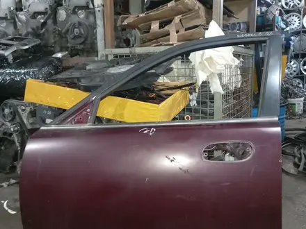 Дверь передняя левая мазда кседокс 9 за 20 000 тг. в Караганда