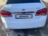 Chevrolet Cruze 2009 года за 2 500 000 тг. в Жетысай – фото 2