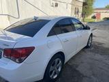 Chevrolet Cruze 2009 года за 2 500 000 тг. в Жетысай – фото 4