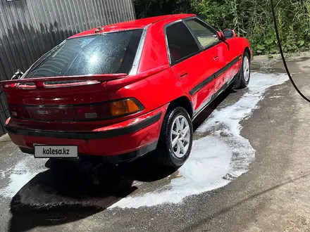 Mazda 323 1993 года за 780 000 тг. в Алматы – фото 7