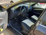 Nissan Almera 2012 года за 4 150 000 тг. в Уральск – фото 5