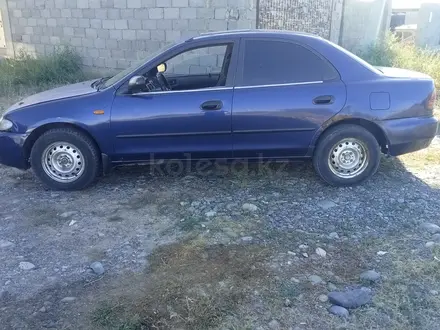 Mazda 323 1994 года за 700 000 тг. в Ушарал – фото 2