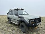 Toyota Land Cruiser 1997 годаүшін10 000 000 тг. в Караганда – фото 4