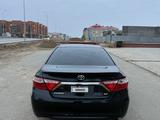 Toyota Camry 2015 года за 6 000 000 тг. в Актобе – фото 4