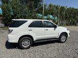 Toyota Fortuner 2011 года за 9 500 000 тг. в Актобе – фото 4