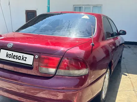 Mazda 626 1994 года за 1 900 000 тг. в Мерке – фото 4