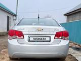 Chevrolet Cruze 2011 года за 2 800 000 тг. в Актобе – фото 2