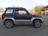 Mitsubishi Pajero Junior 1996 годаfor2 000 000 тг. в Караганда – фото 2