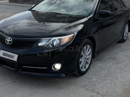 Toyota Camry 2013 года за 8 150 000 тг. в Жанаозен – фото 11