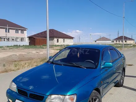 Toyota Carina E 1997 года за 2 500 000 тг. в Атырау – фото 4