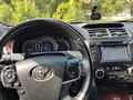 Toyota Camry 2014 года за 10 500 000 тг. в Караганда – фото 9