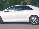 Toyota Camry 2014 года за 9 000 000 тг. в Караганда