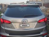 Hyundai Santa Fe 2016 года за 7 500 000 тг. в Актобе – фото 2