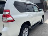 Toyota Land Cruiser Prado 2014 года за 18 400 000 тг. в Актобе – фото 5