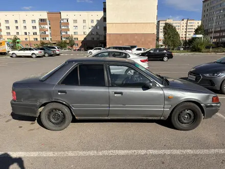 Mazda 323 1992 года за 325 000 тг. в Астана – фото 2