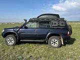 Nissan Patrol 2001 года за 7 500 000 тг. в Астана – фото 4