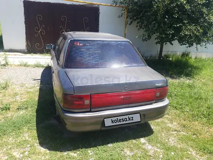 Mazda 323 1991 года за 400 000 тг. в Шымкент – фото 4