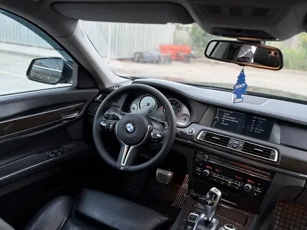 BMW 750 2010 года за 12 000 000 тг. в Астана – фото 19