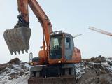 Doosan  DX140W 2010 года за 24 560 000 тг. в Астана – фото 2