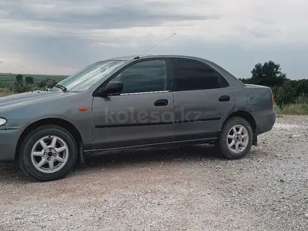 Mazda 323 1994 года за 1 200 000 тг. в Талдыкорган – фото 4