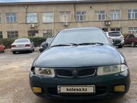 Mitsubishi Carisma 1998 годаүшін1 100 000 тг. в Шымкент