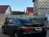 Toyota Camry 2016 года за 10 200 000 тг. в Актобе – фото 2