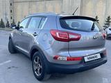 Kia Sportage 2013 года за 7 000 000 тг. в Астана – фото 2