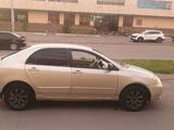 Toyota Corolla 2004 года за 2 600 000 тг. в Астана – фото 2