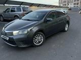 Toyota Corolla 2013 года за 6 600 000 тг. в Караганда