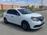 Renault Logan 2014 года за 2 100 000 тг. в Актобе – фото 4