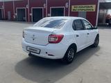 Renault Logan 2014 года за 2 100 000 тг. в Актобе – фото 5