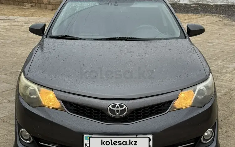 Toyota Camry 2013 года за 11 000 000 тг. в Жанаозен