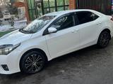 Toyota Corolla 2013 года за 6 900 000 тг. в Алматы – фото 2