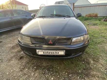 Mitsubishi Carisma 2001 года за 1 700 000 тг. в Уральск – фото 9