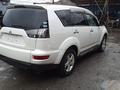 Фара (фонарь) Mitsubishi OUTLANDER привозной оригинал б/у за 20 000 тг. в Астана