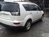 Фара (фонарь) Mitsubishi OUTLANDER привозной оригинал б/у за 20 000 тг. в Астана