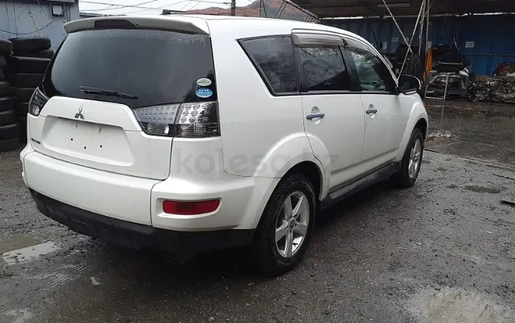 Фара (фонарь) Mitsubishi OUTLANDER привозной оригинал б/у за 20 000 тг. в Астана