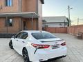 Toyota Camry 2018 года за 7 400 000 тг. в Жанаозен – фото 17