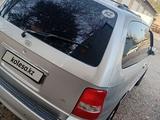 Kia Carnival 2005 года за 3 200 000 тг. в Шымкент – фото 4