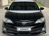 Toyota Camry 2014 года за 8 400 000 тг. в Шымкент