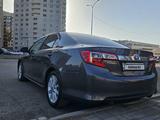 Toyota Camry 2013 года за 9 800 000 тг. в Астана