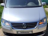 Volkswagen Touran 2008 годаүшін3 900 000 тг. в Тараз