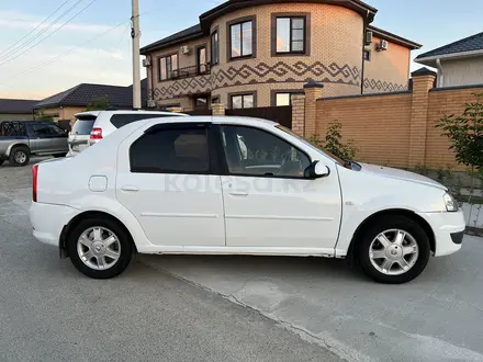 Renault Logan 2013 года за 3 300 000 тг. в Атырау – фото 4